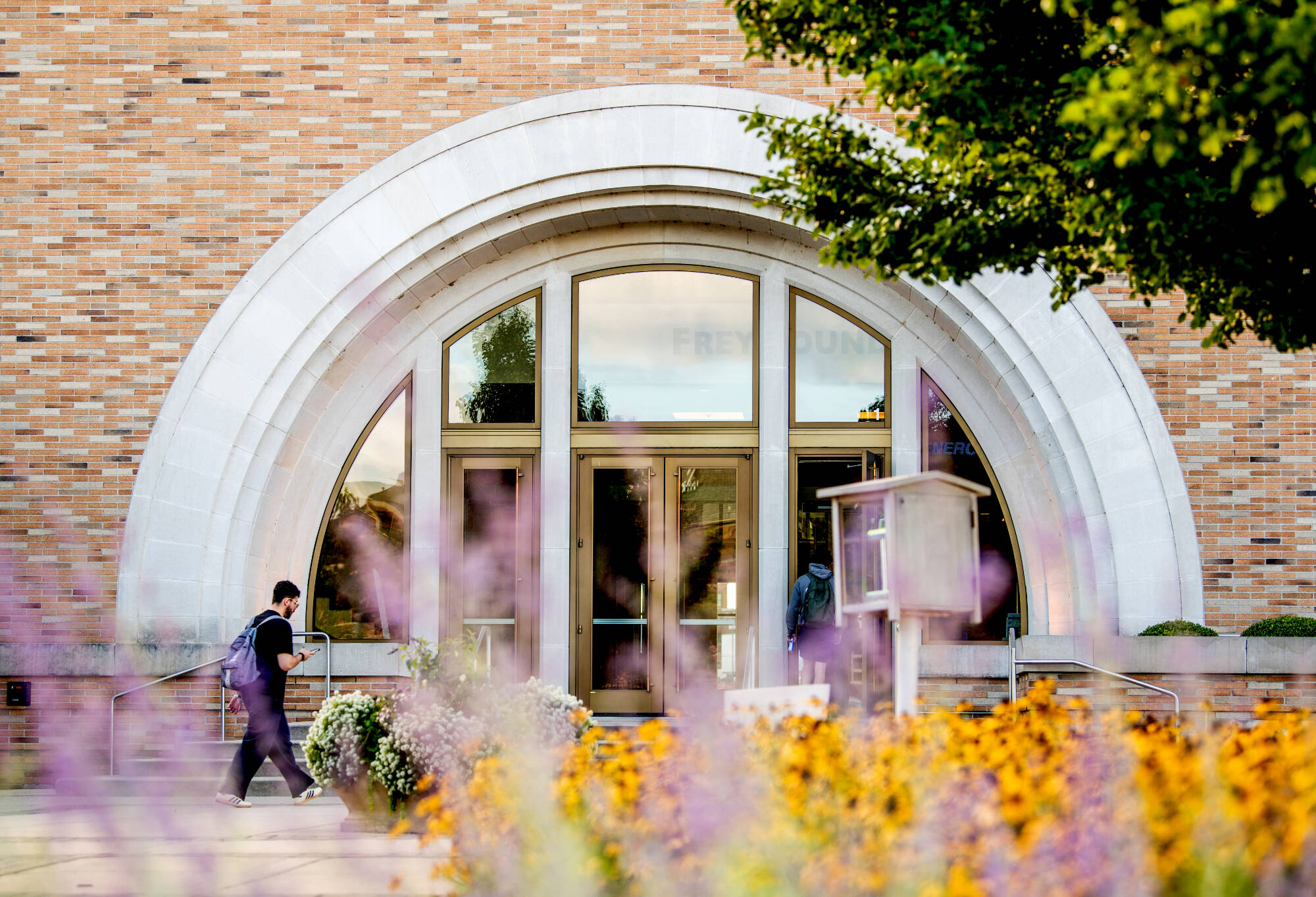 L. William Seidman Center front entrance with flowers